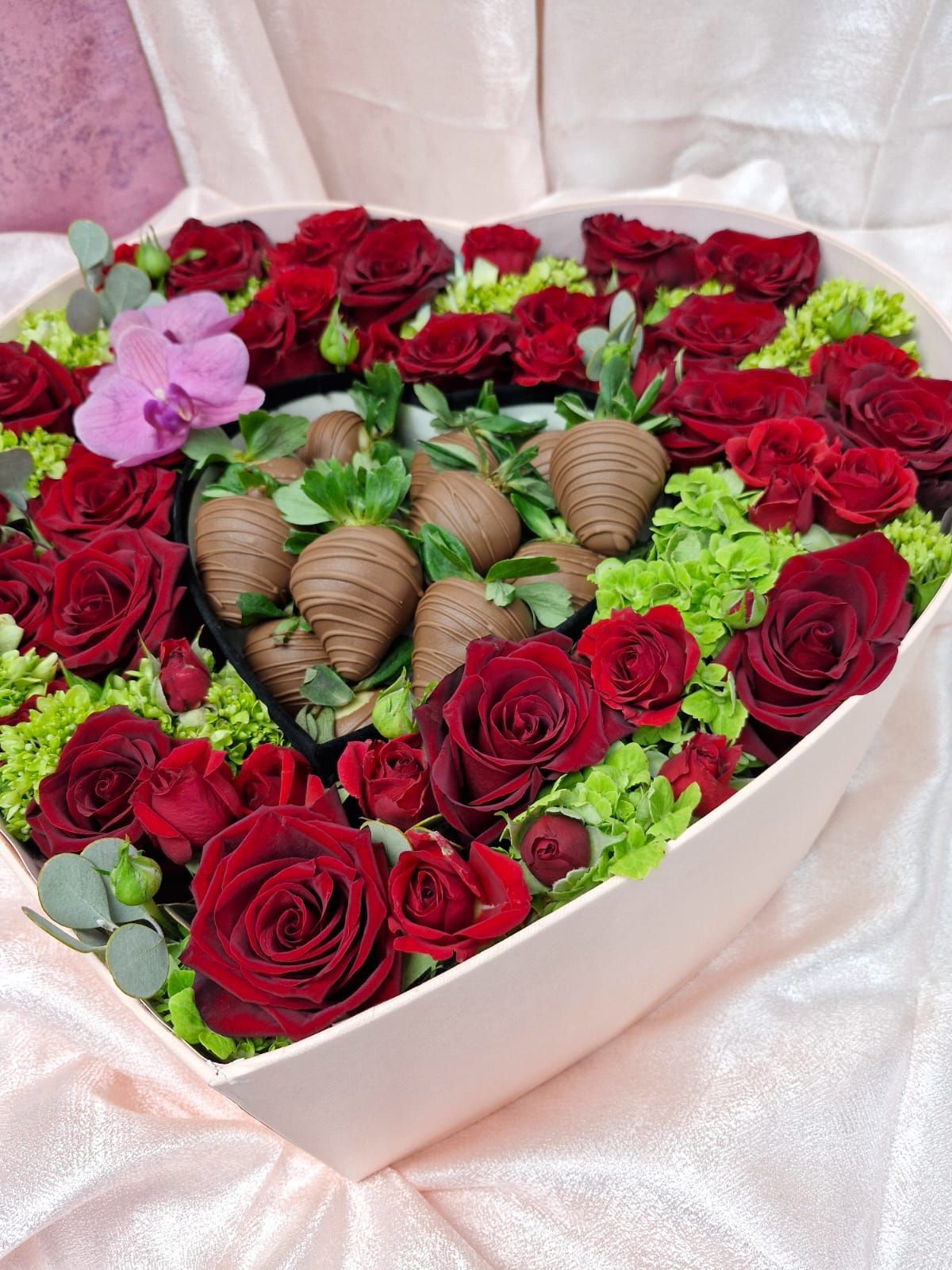 A box filled with a variety of fruits and vegetables