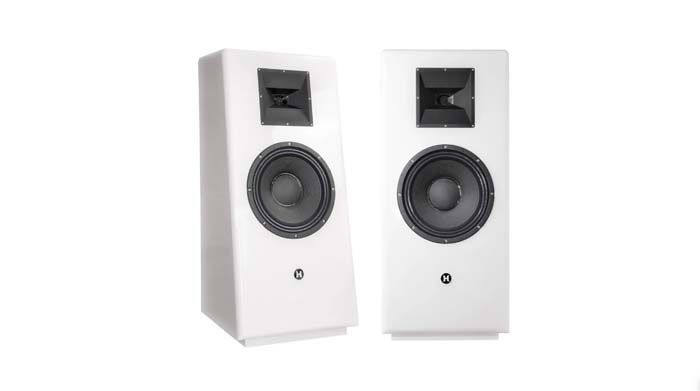 A pair of white speakers sitting next to each other
