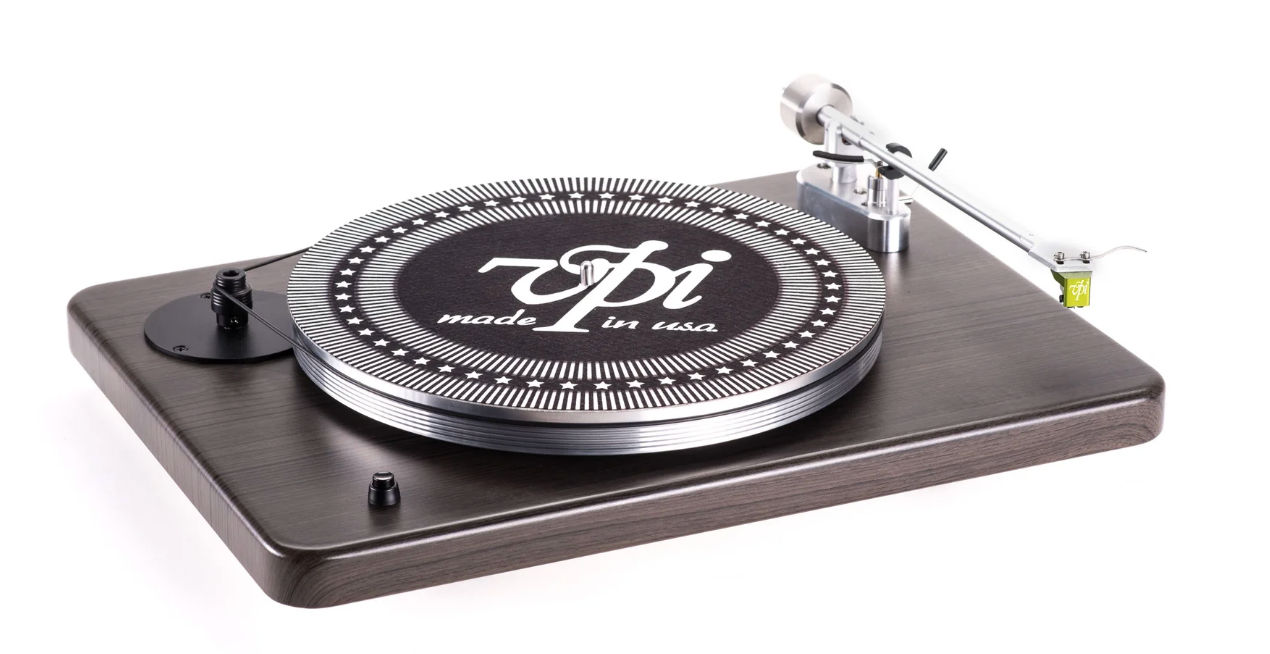 A black and silver record player on a white background