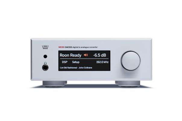 A white amplifier with a screen that says room ready