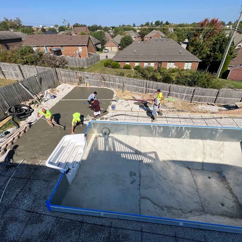Men Working on The Pool — Winchester, KY — Underground Kings, LLC