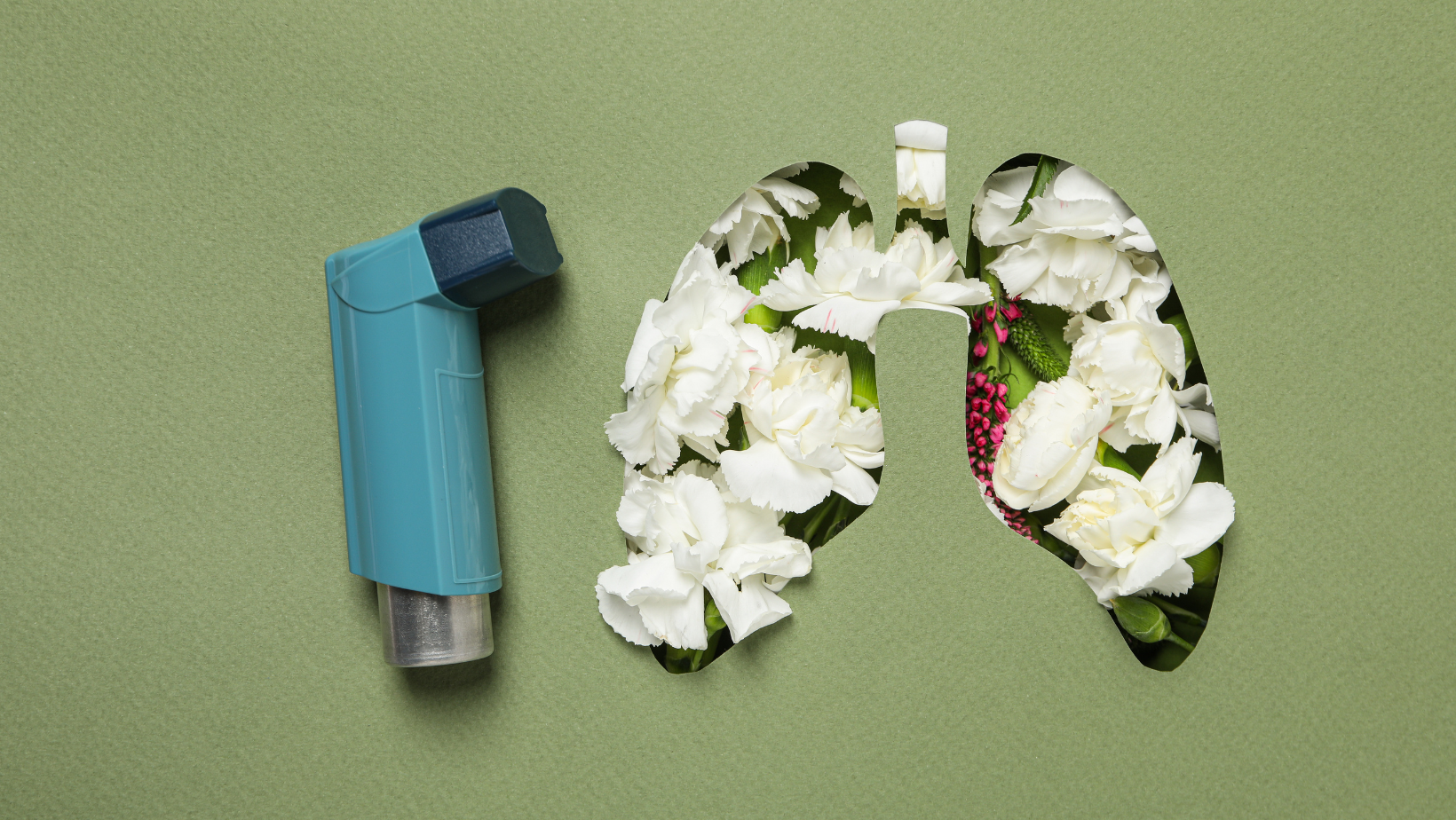 An inhaler and lungs made of flowers on a green background.
