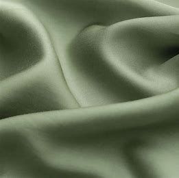 A close up of a piece of green fabric.