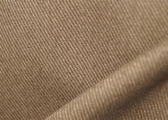A close up of a piece of brown fabric.