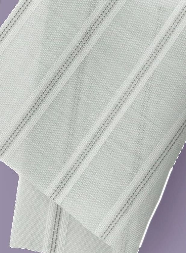 A close up of a white towel on a purple background