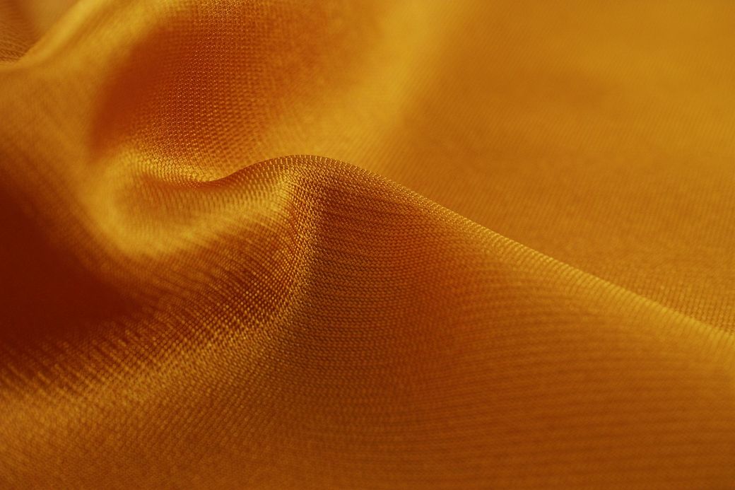 A close up of a piece of yellow fabric.