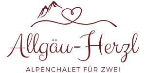 Ein Logo für ein Chalet mit einem Herz und Bergen im Hintergrund.