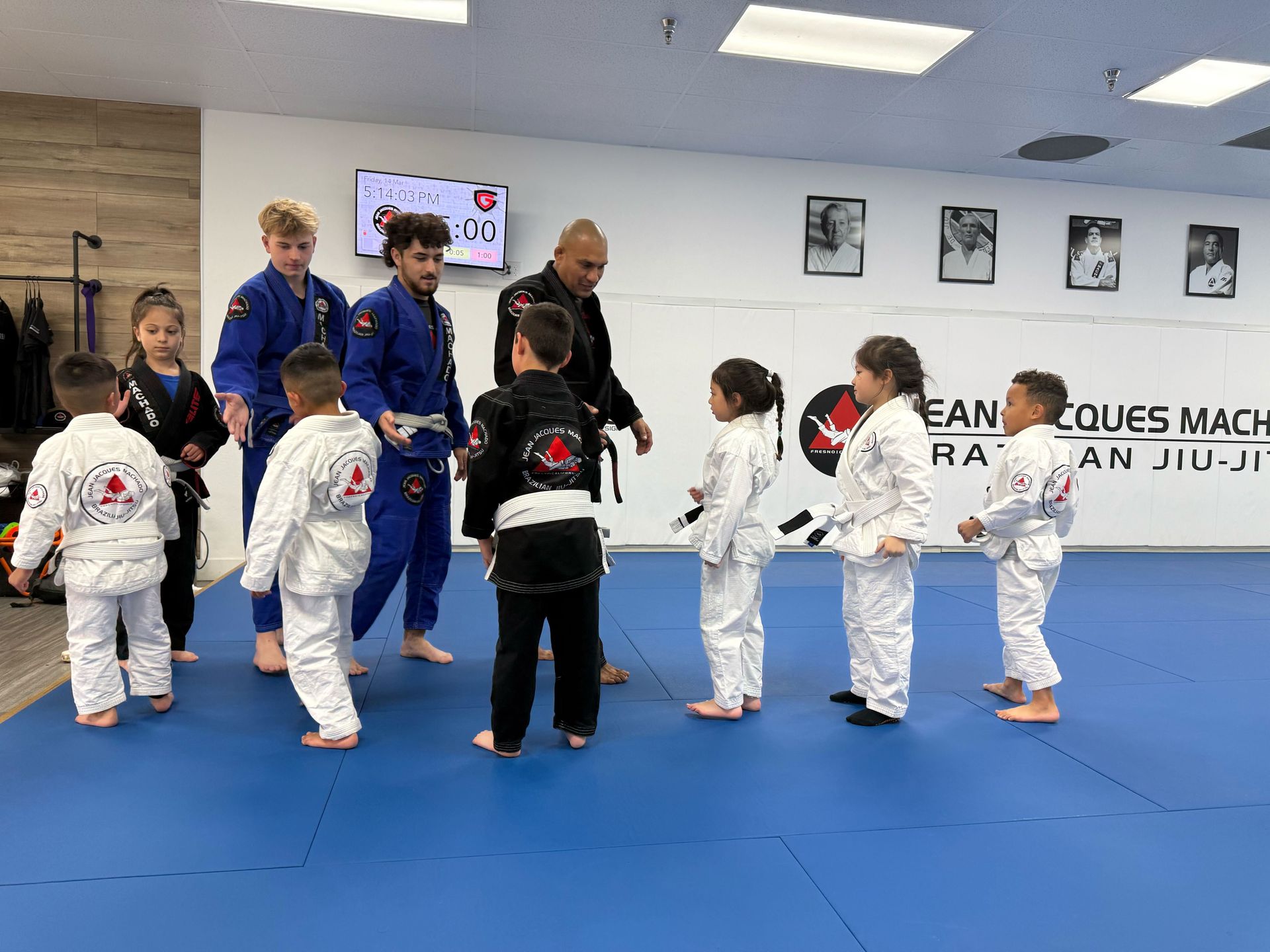 Kids learning Brazilian Jiu-Jitsu at Jean Jacques Machado Fresno academy to build confidence.