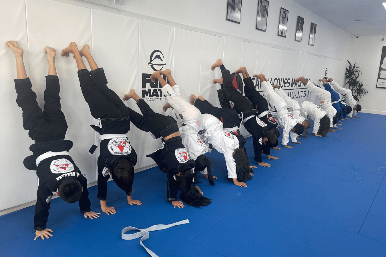 Students practice grappling drills at Jean Jacques Machado Jiu-Jitsu Fresno in Fresno, CA, building focus and discipline.
