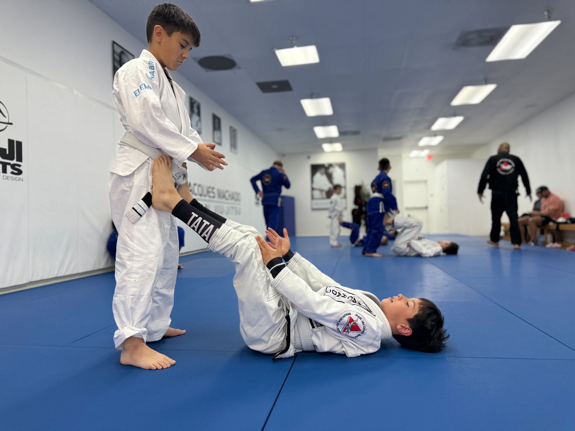 Students train Brazilian Jiu-Jitsu at Jean Jacques Machado Fresno in Fresno, CA, building confidence