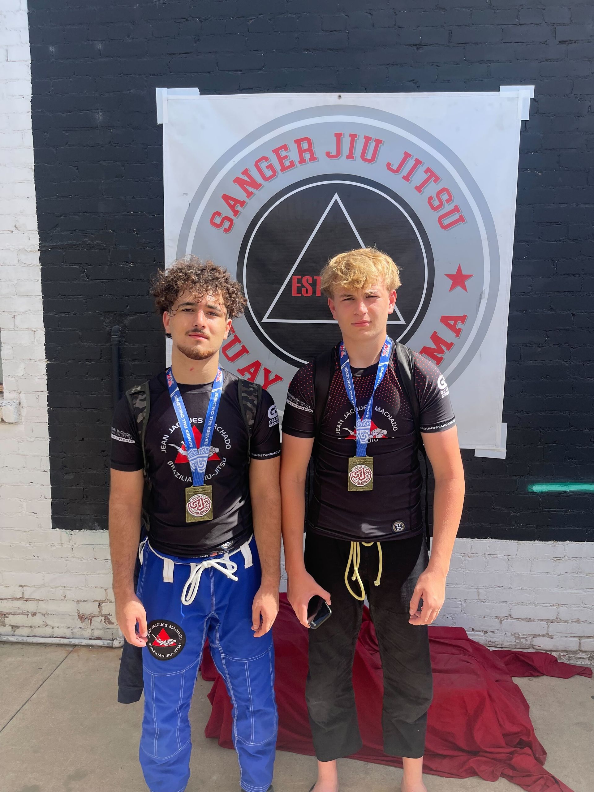 Students practicing controlled jiu-jitsu drills at Jean Jacques Machado Jiu-Jitsu Fresno in Fresno, 