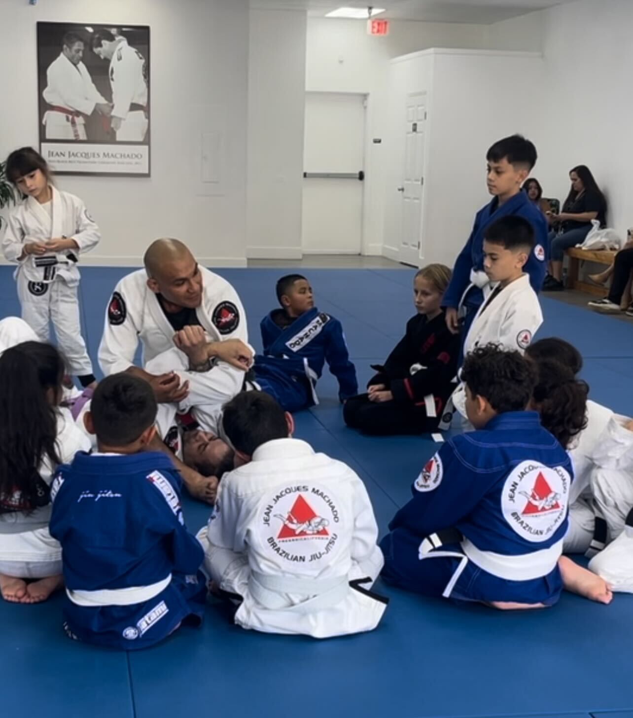 Students practicing martial arts techniques at Jean Jacques Machado Fresno.