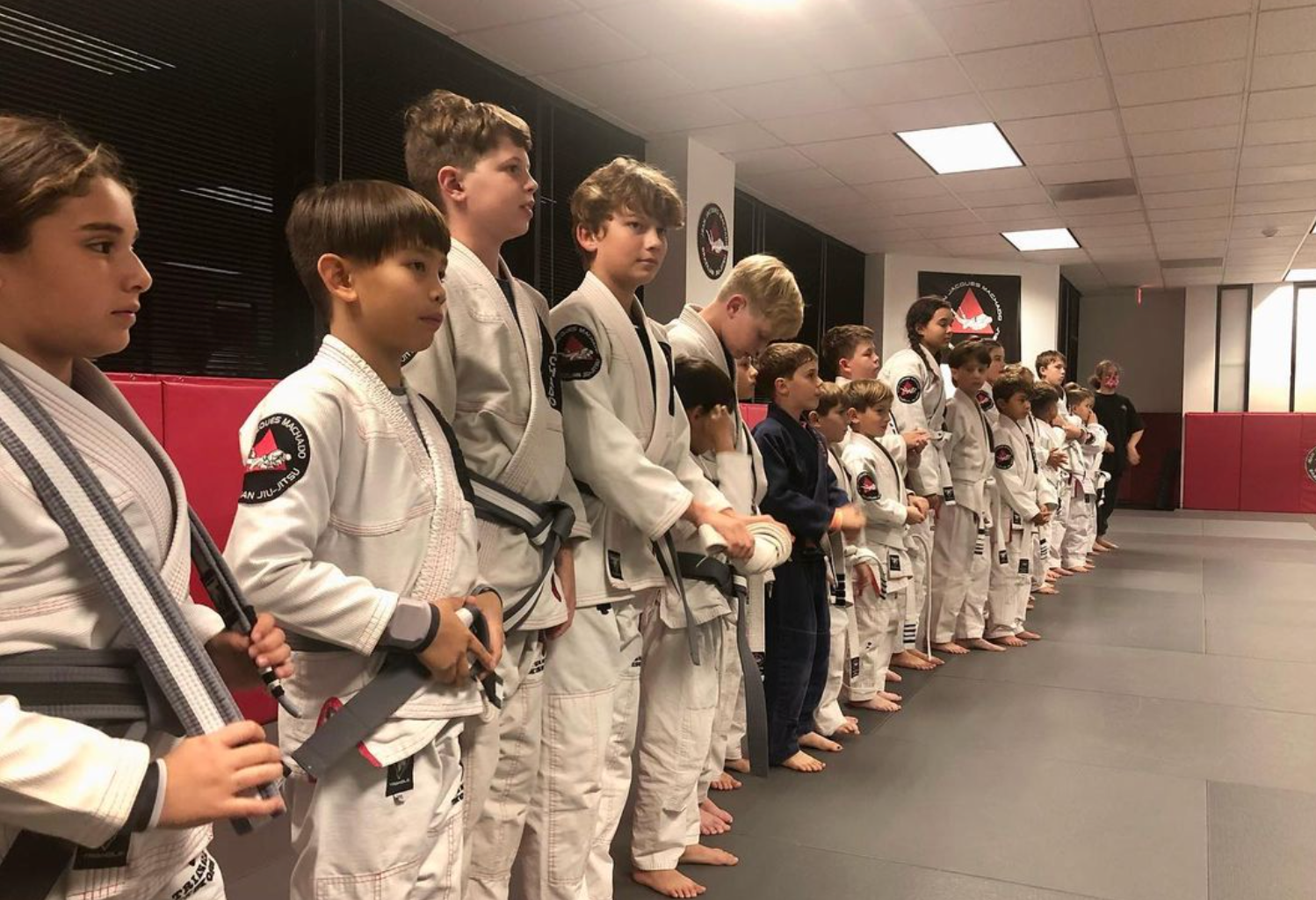 Adults practicing Brazilian Jiu-Jitsu drills at Jean Jacques Machado Fresno in Fresno, CA.