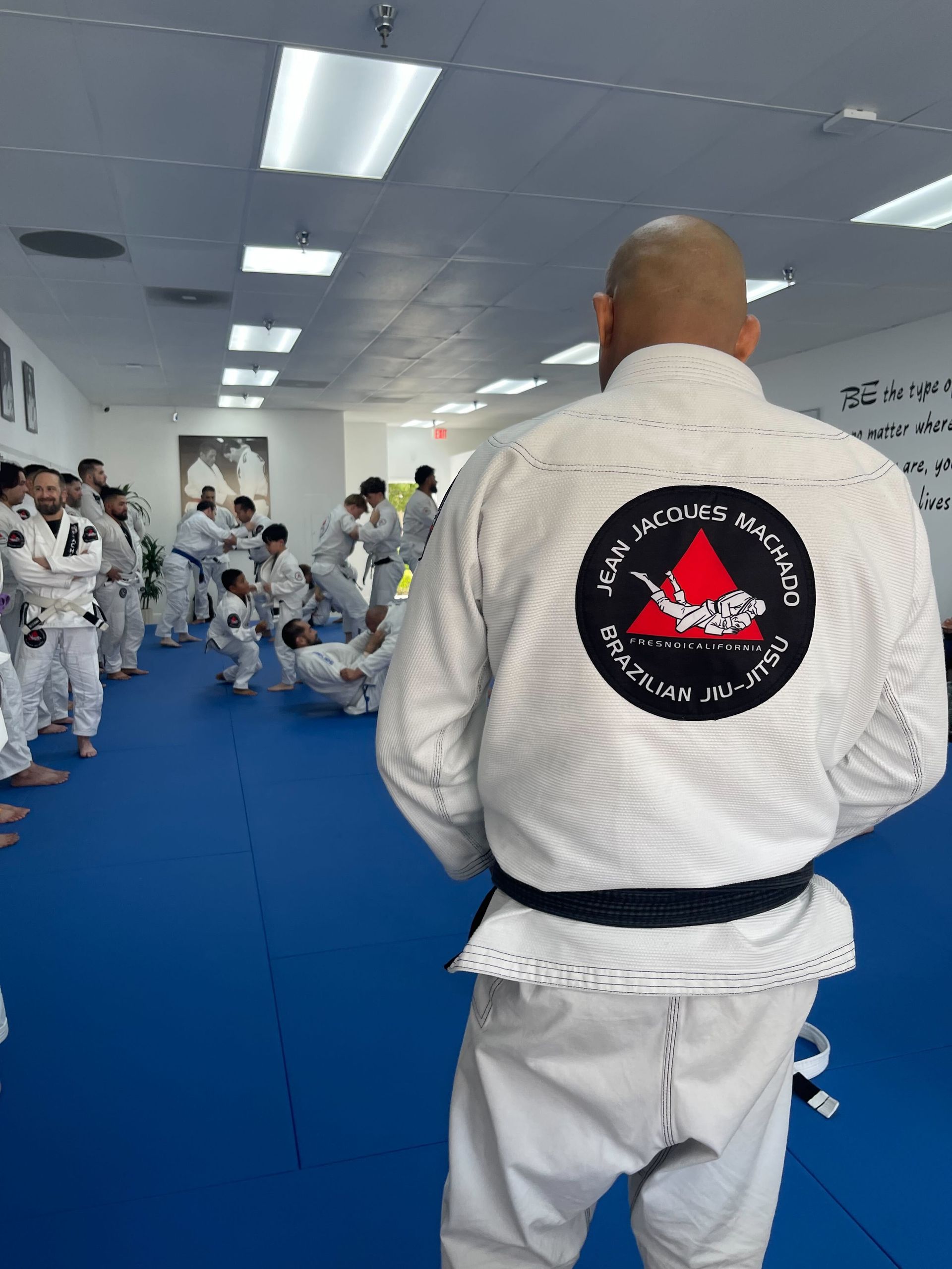 Students practicing Brazilian Jiu-Jitsu drills at Jean Jacques Machado Fresno in Fresno, CA.