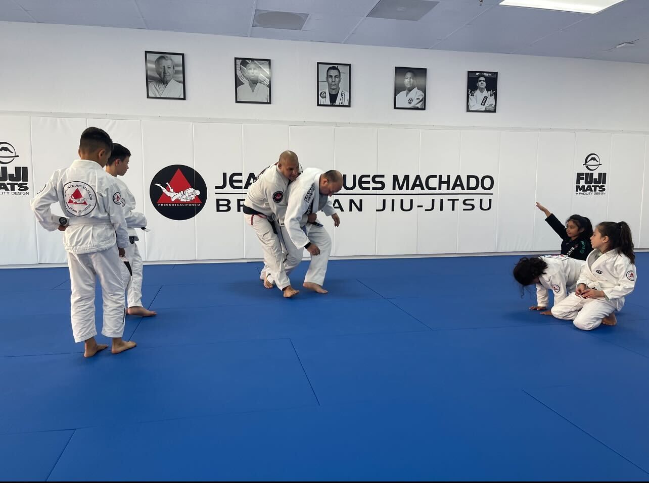 Kids practicing Brazilian Jiu-Jitsu drills at Jean Jacques Machado Jiu-Jitsu Fresno in Fresno, CA to build focus.
