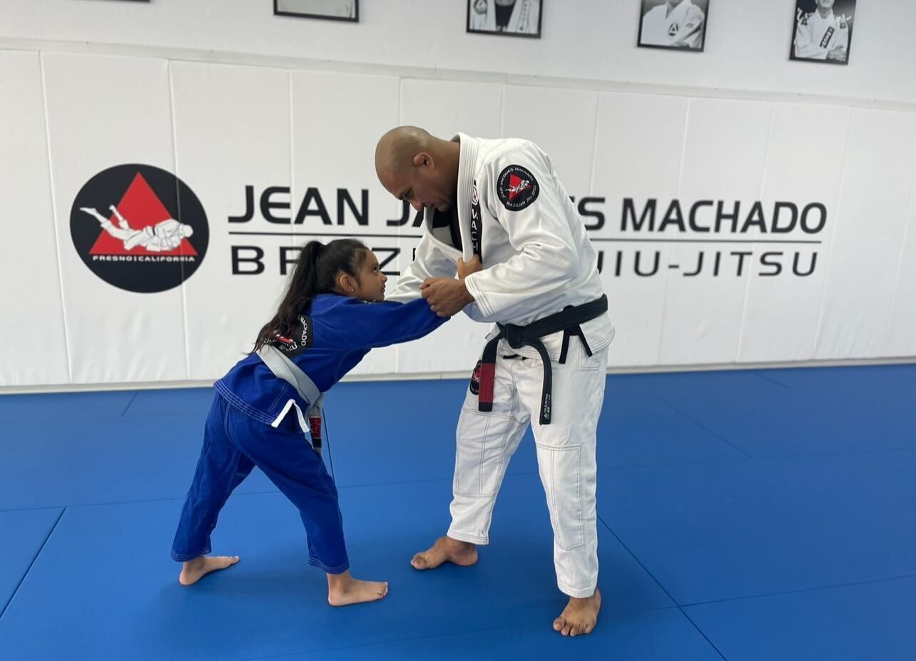 Kids practice safe grappling drills at Jean Jacques Machado Jiu-Jitsu Fresno in Fresno, CA, building confidence and focus.