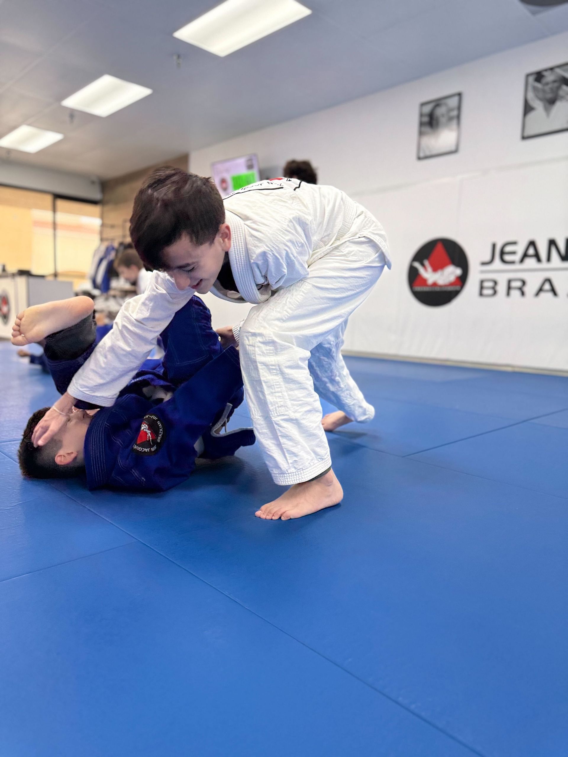 Kids practicing controlled grappling drills at Jean Jacques Machado Jiu-Jitsu Fresno in Fresno, CA for confidence and focus.