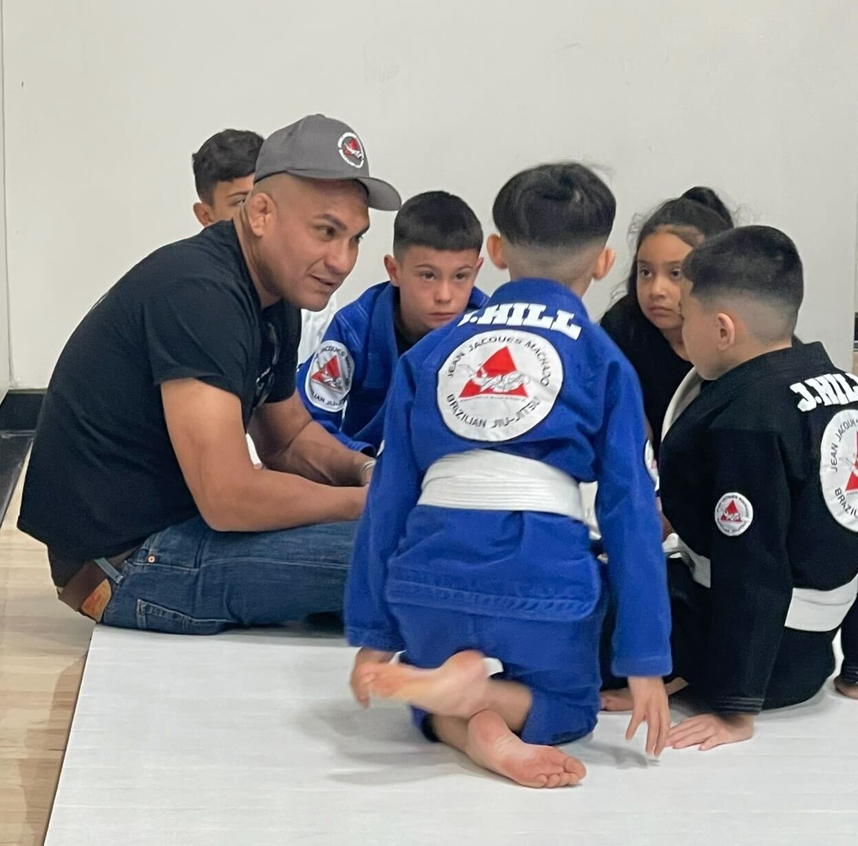 Students practicing Brazilian Jiu-Jitsu at Jean Jacques Machado Fresno to learn brazilian ji