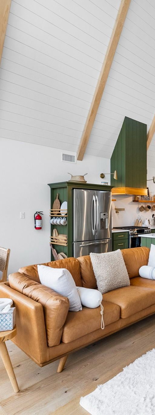 Skyline of Jersey City, New Jersey, with buildings of various heights along the waterfront. Blue water in the foreground.