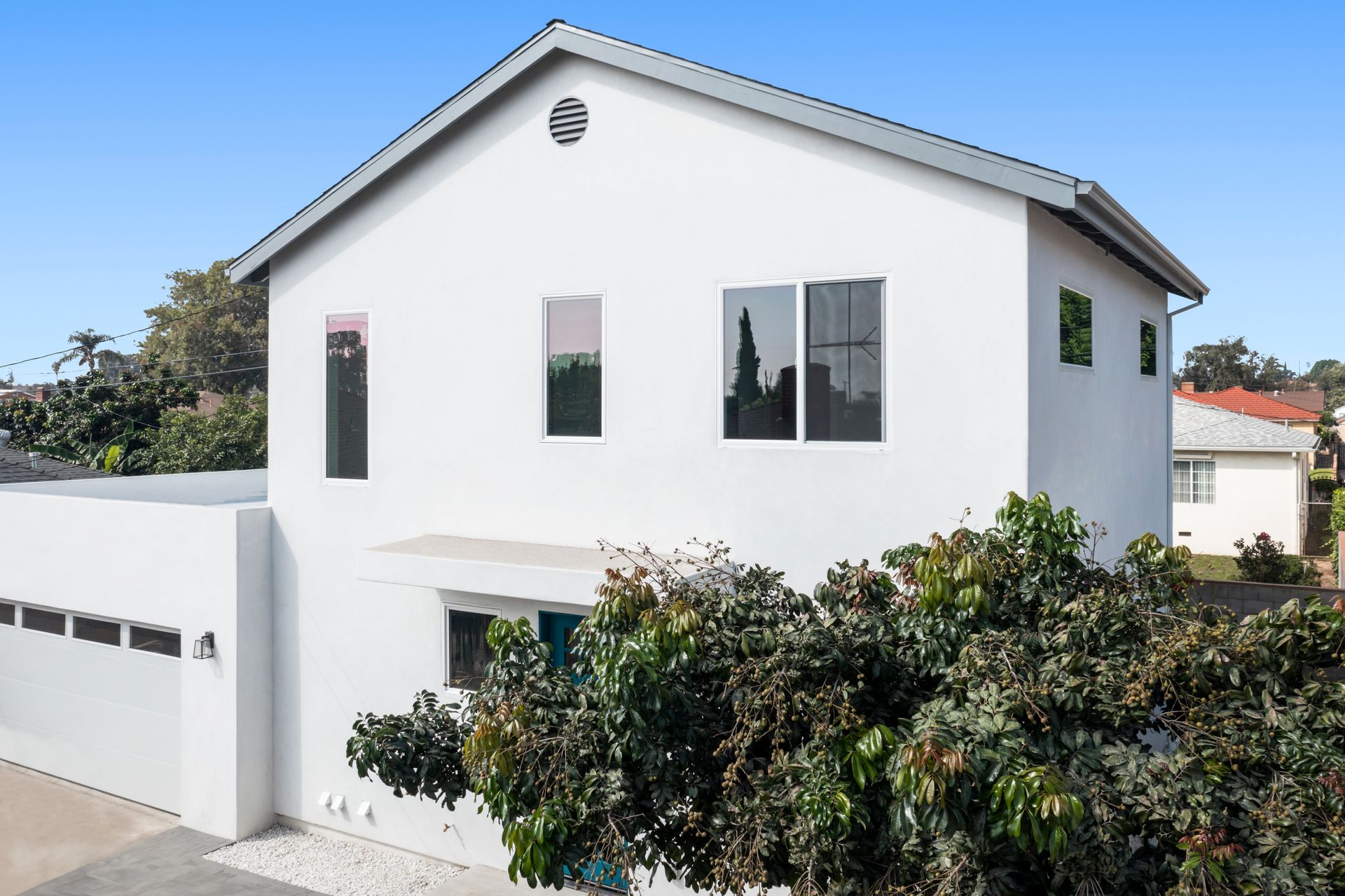 A 1200 square foot, three-bedroom, two story accessory dwelling unit (ADU) backyard home, attached to the newly rebuilt garage.