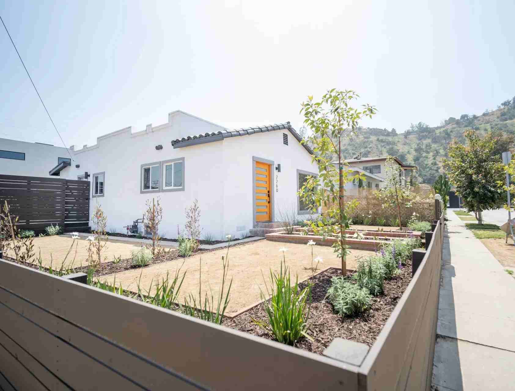 A white accessory dwelling unit (ADU) backyard home in Los Angeles, CA