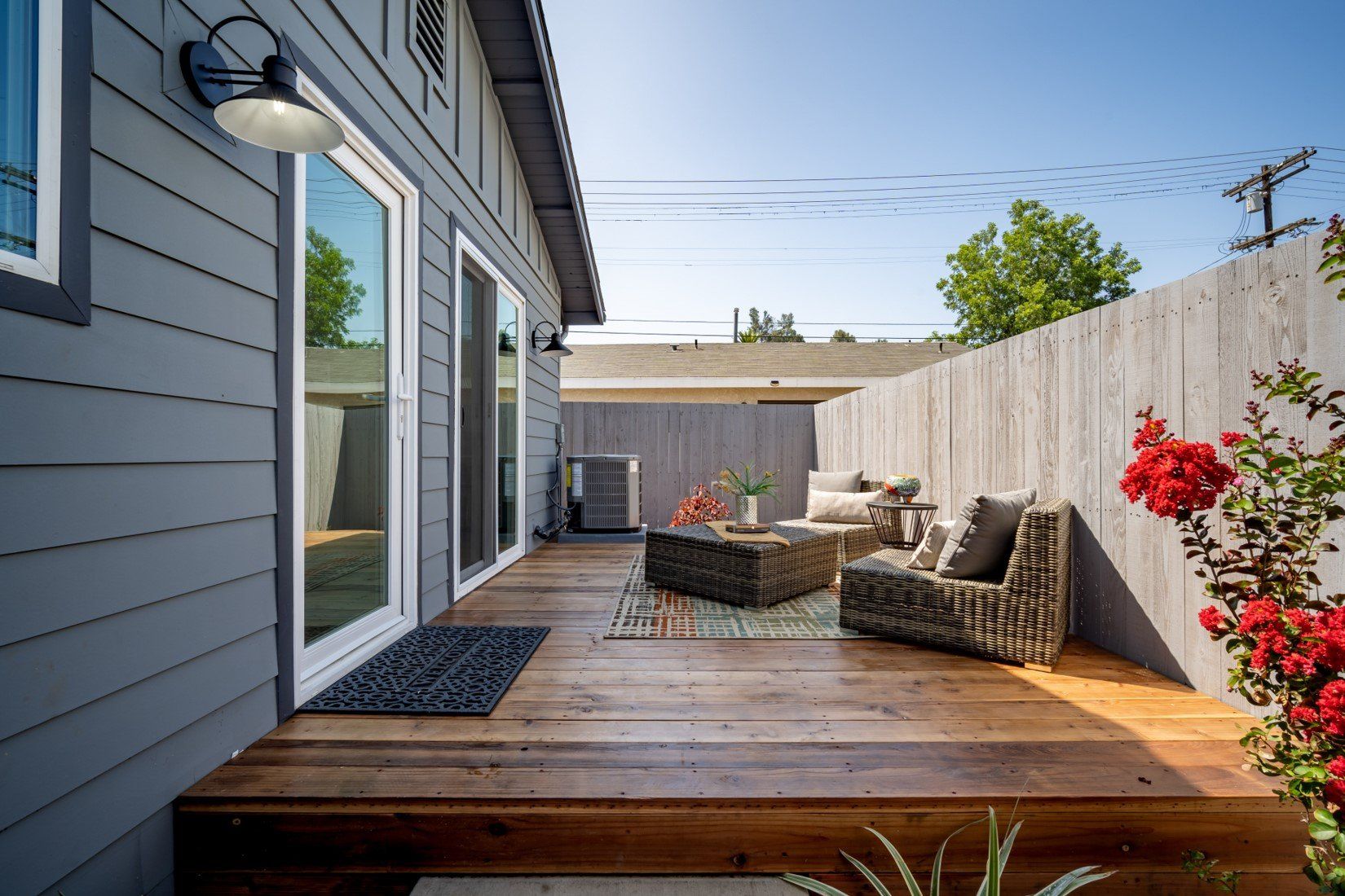 Reclaimed side yard converted into quaint outdoor patio for accessory dwelling unit (ADU) granny flat