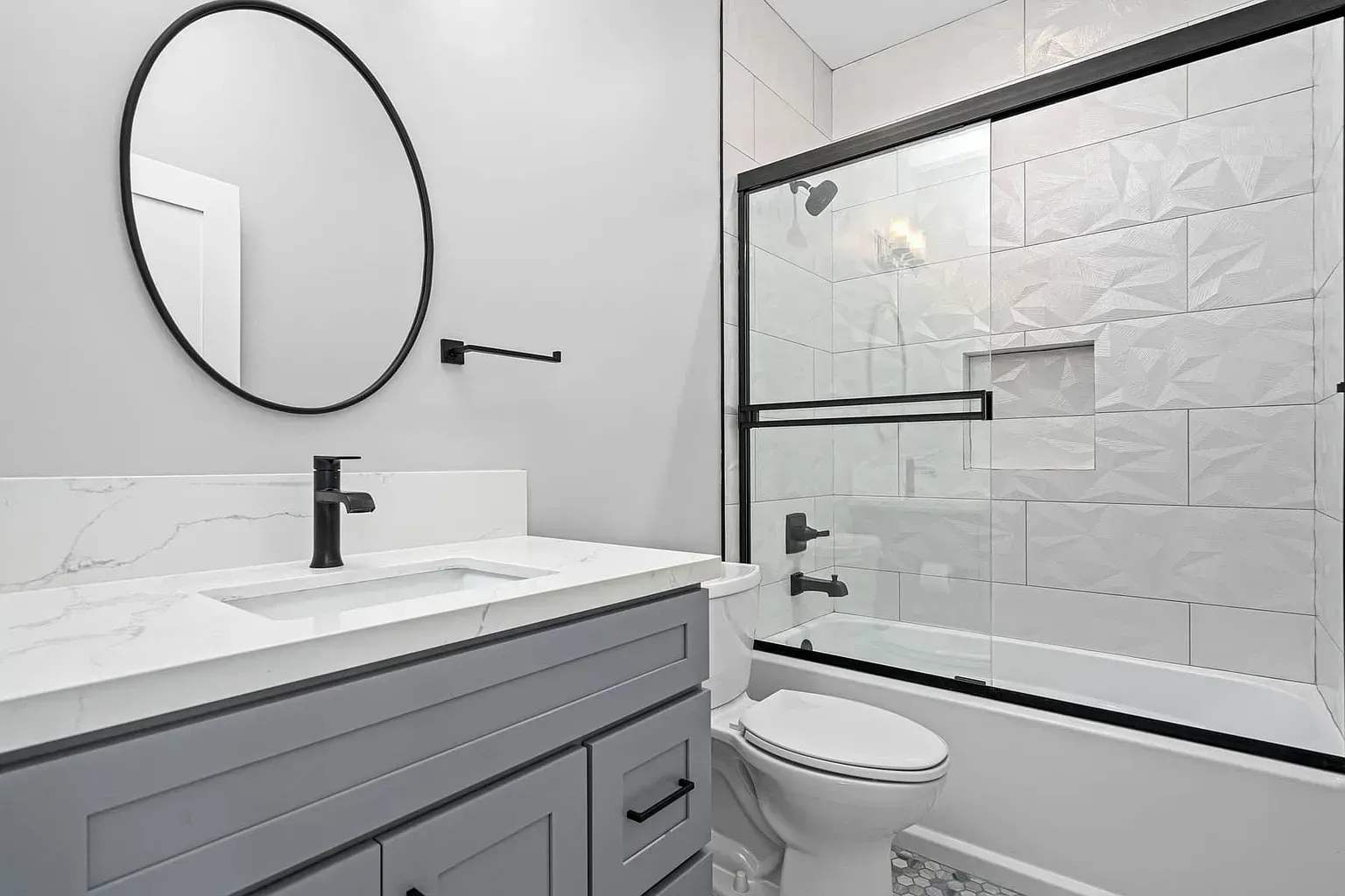 The private, ensuite, full bathroom in the master bedroom of an accessory dwelling unit (ADU).