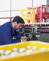 Man Operating Automated Conveyor System — Knoxville, TN — RBM Company