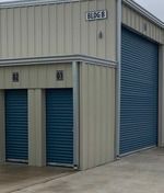 Storage units with blue rolling doors; Building B with units 01 and 02.