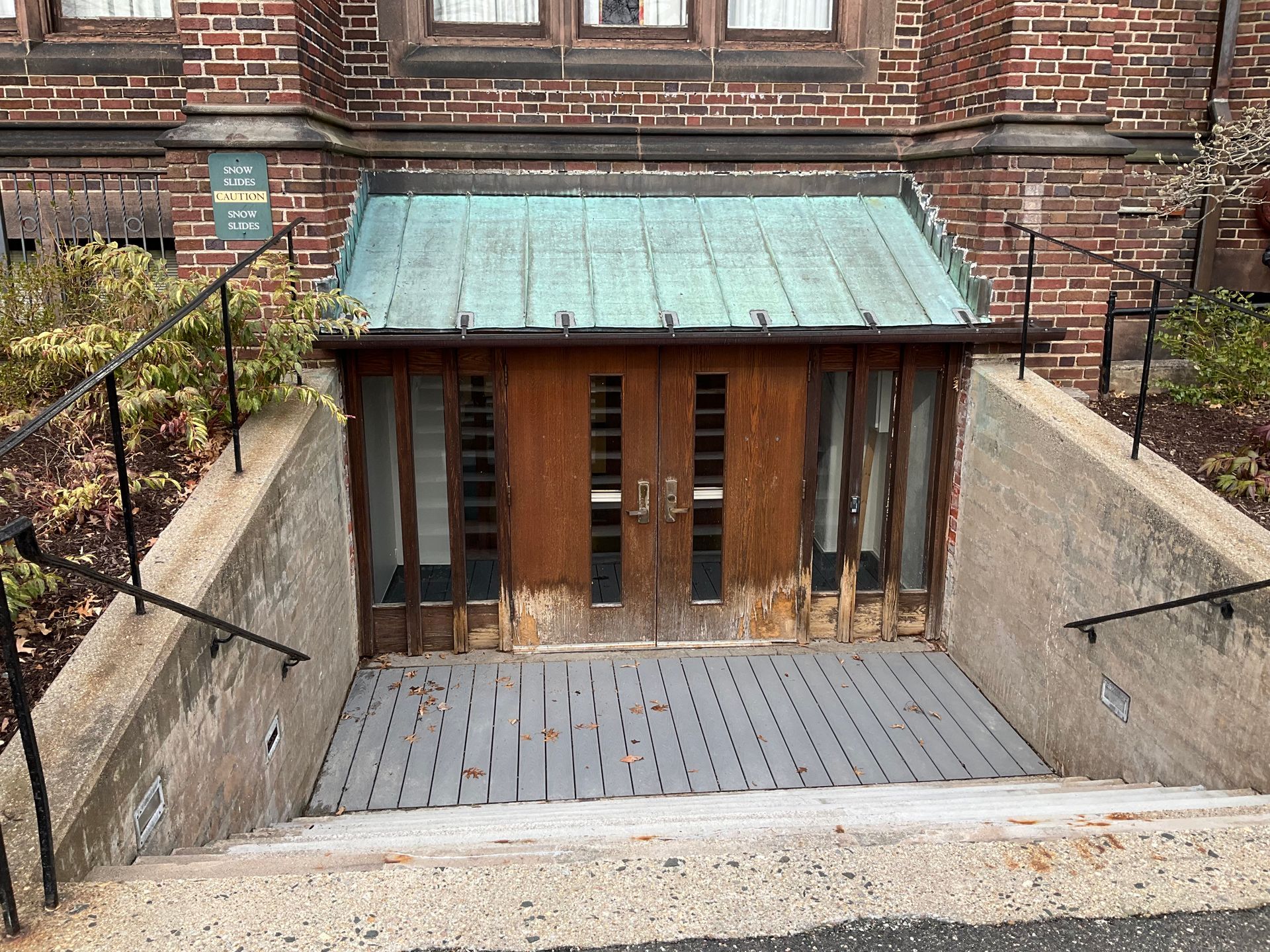 The entrance to a building with stairs leading up to it