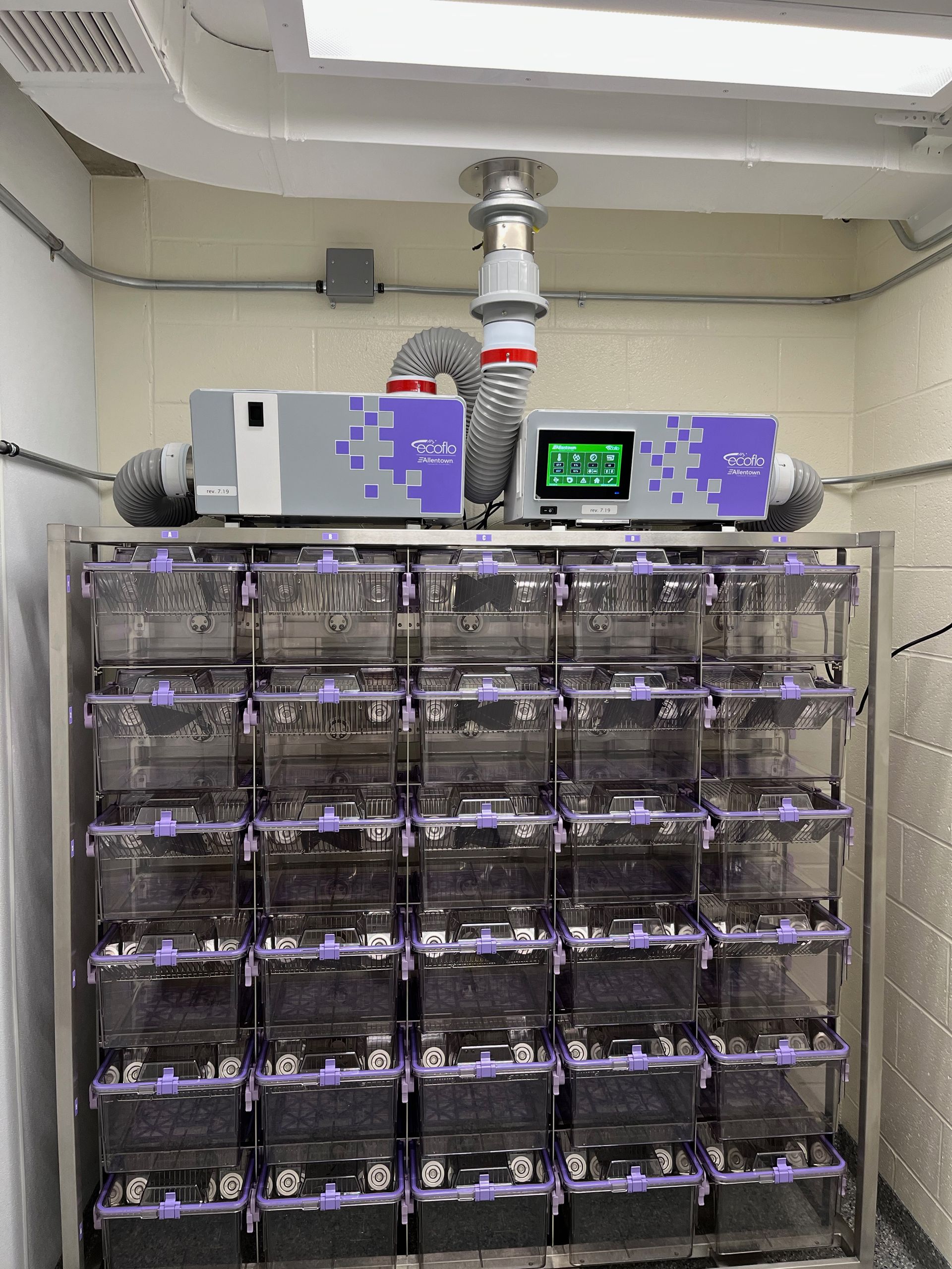 A room filled with lots of boxes and a machine.