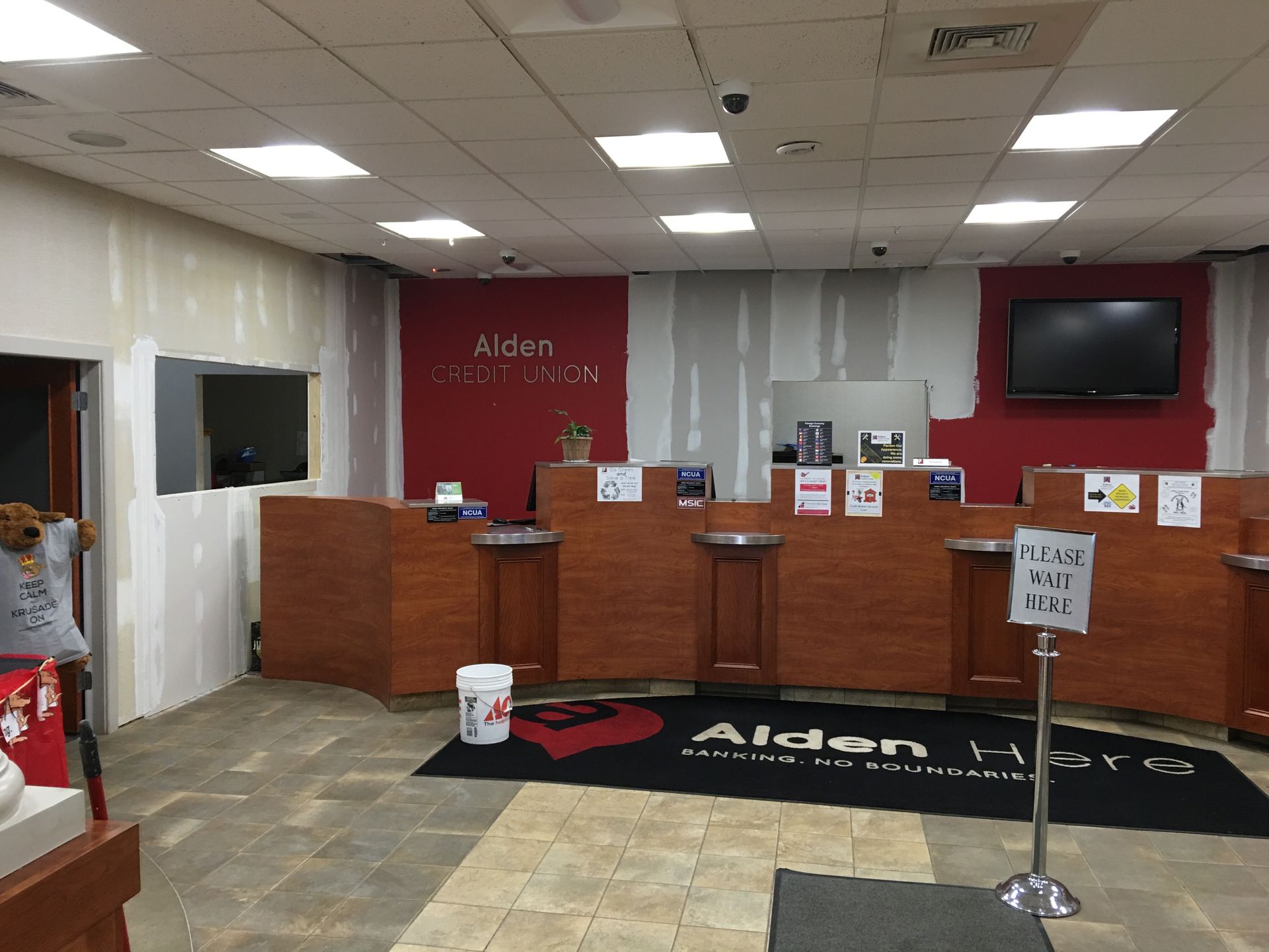 A bank with a sign that says ' aiden ' on it