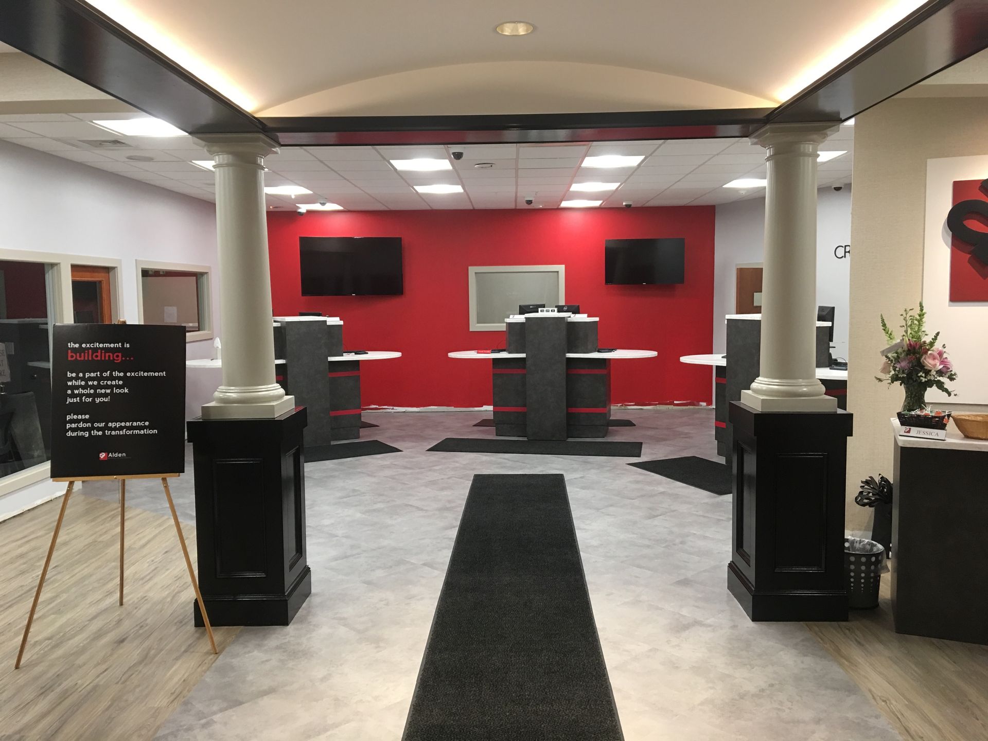 A large room with columns and a sign that says ' banking ' on it