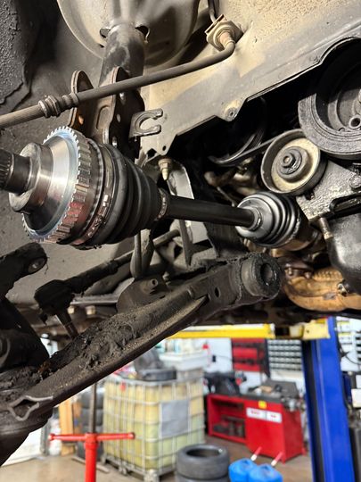 Axle and CV Joint Assembly in Progress | EASE Auto Service