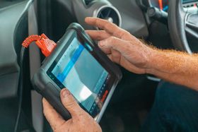 Mechanic Using Diagnostic Scanner Tool | EASE Auto Service