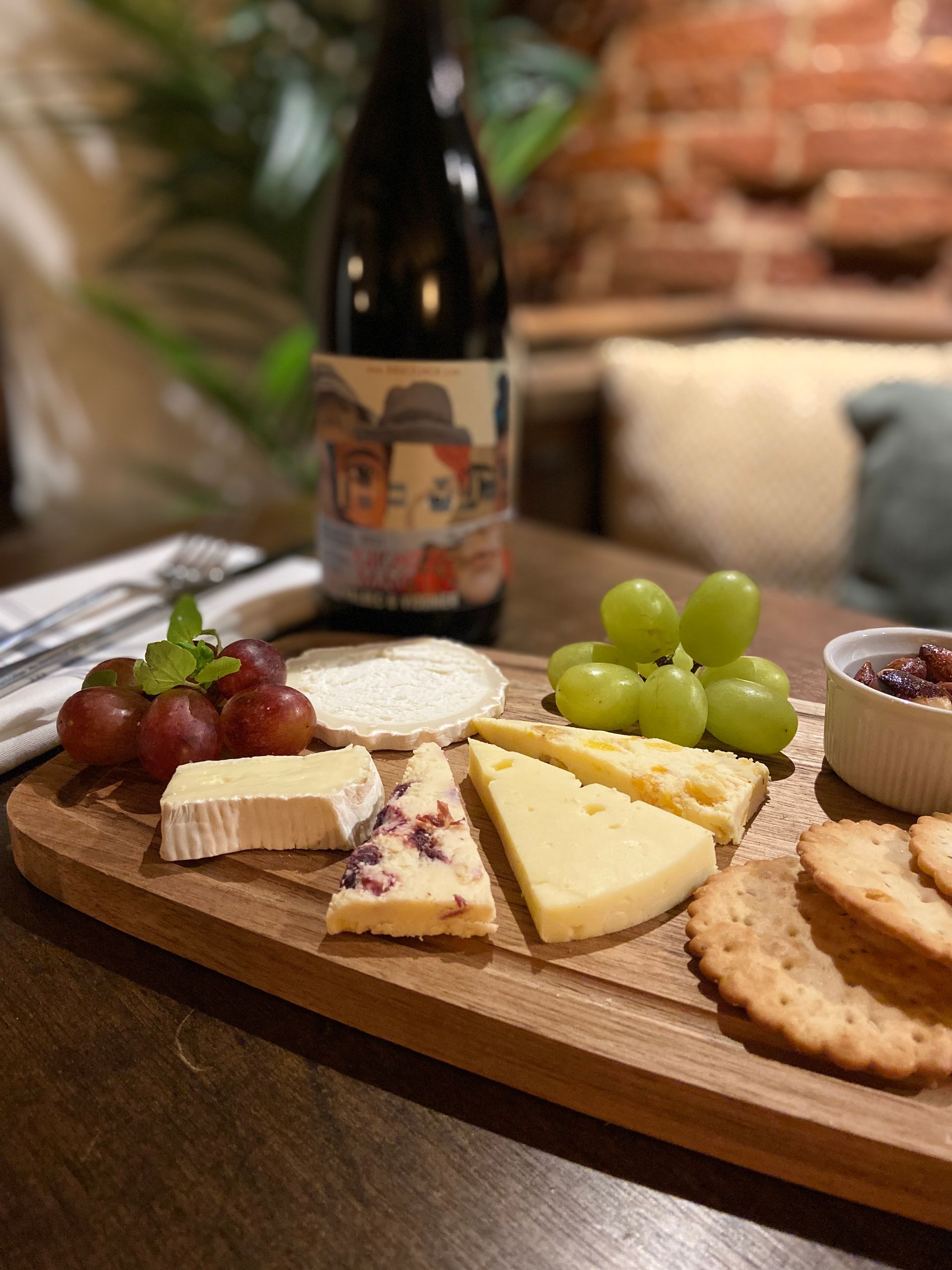 Cheese board, wine and grapes at The Fox and Hounds