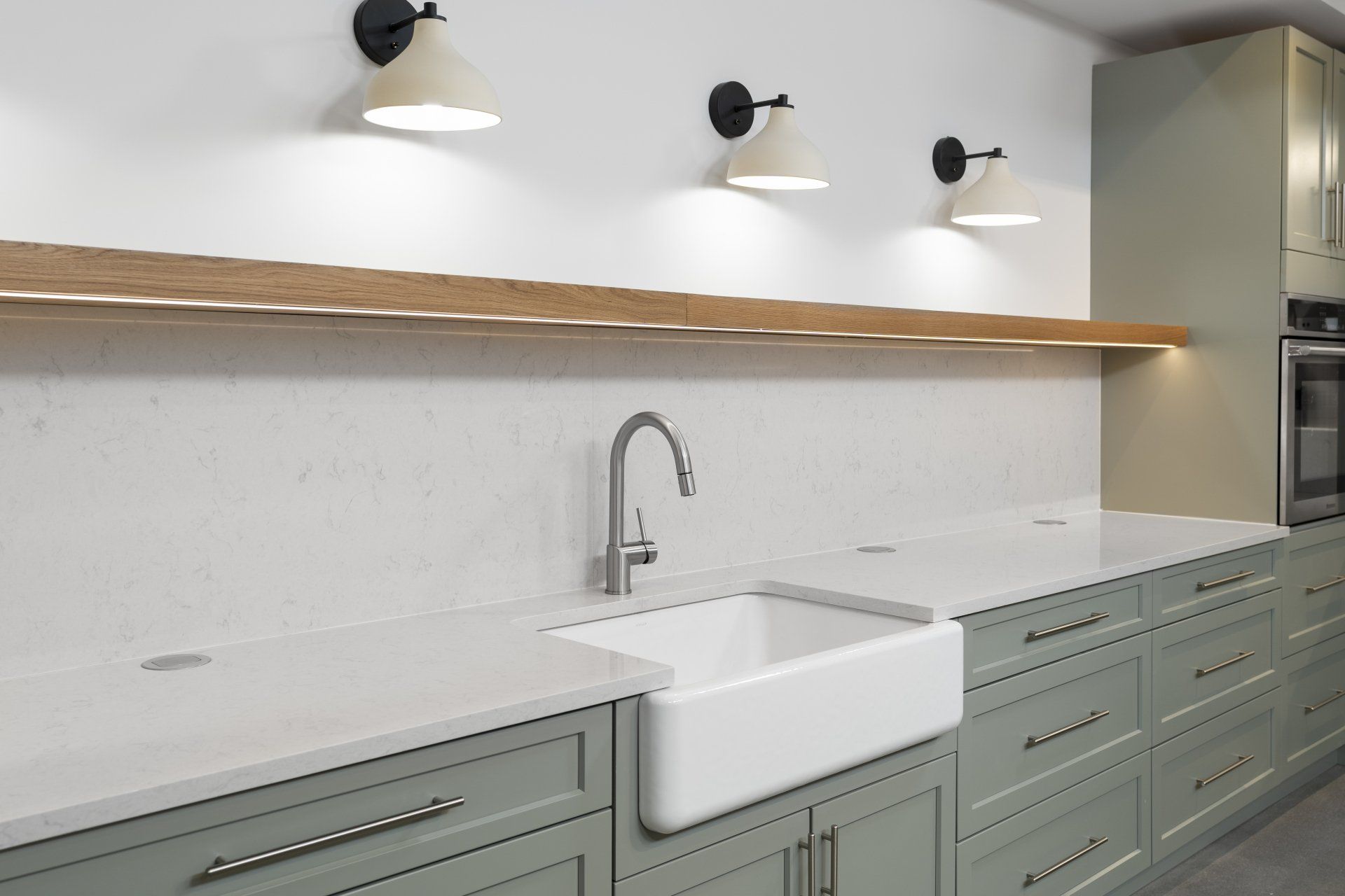 Kohler Farm sink, Hafele Under Counter Lighting System Jaclo Drain, Hamat Brushed Stainless Steel Faucet