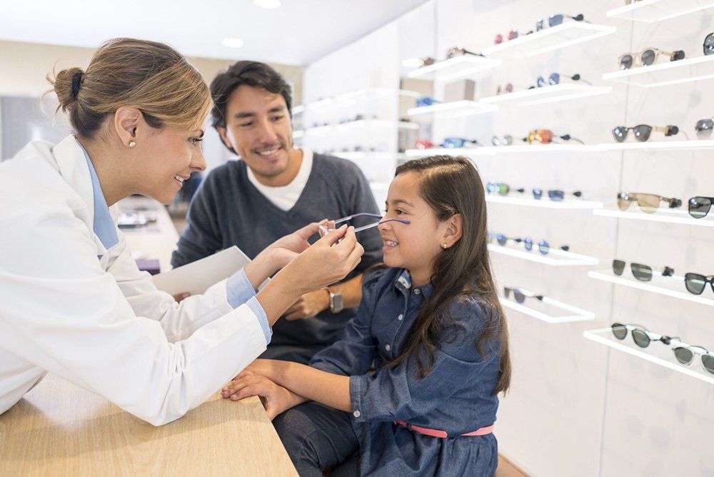 Girl at the Optician's Shop | The Whitefish Eye Center