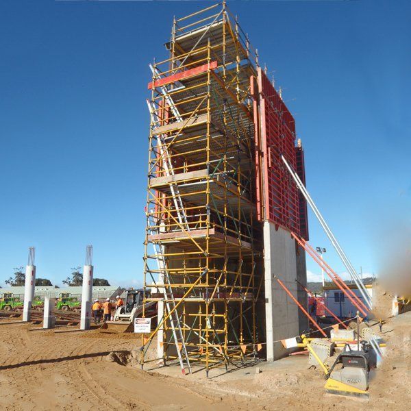 A large building under construction with scaffolding around it