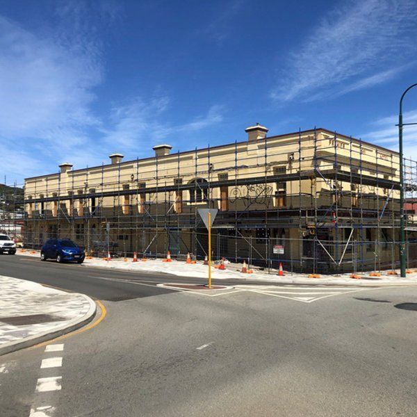 A building under construction with scaffolding around it