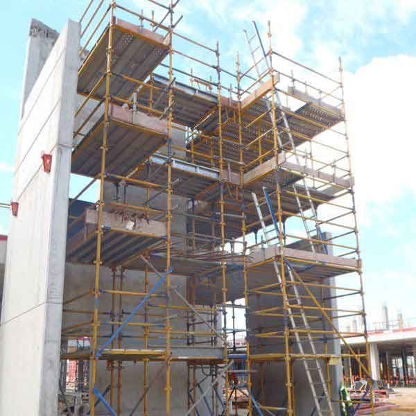 A large building is being built with scaffolding around it.
