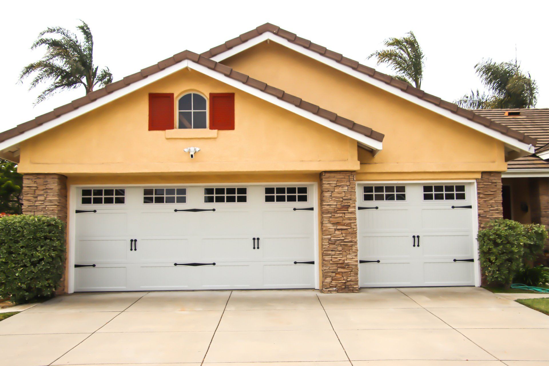 Home Exterior With Carriage Style Garage Doors  - Phoenix, AZ - DW Garage Door