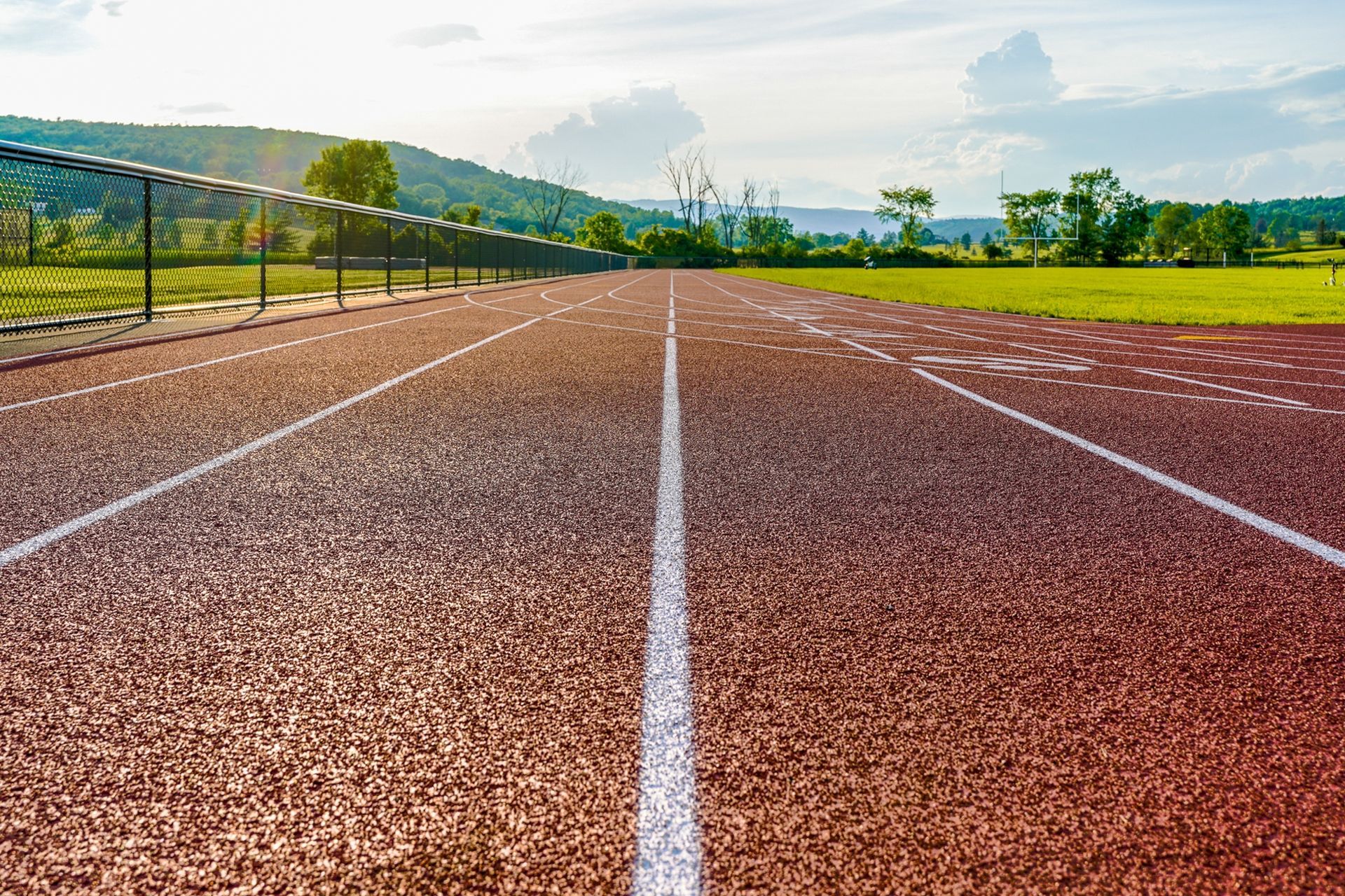 A running track with a white line on the side of it.