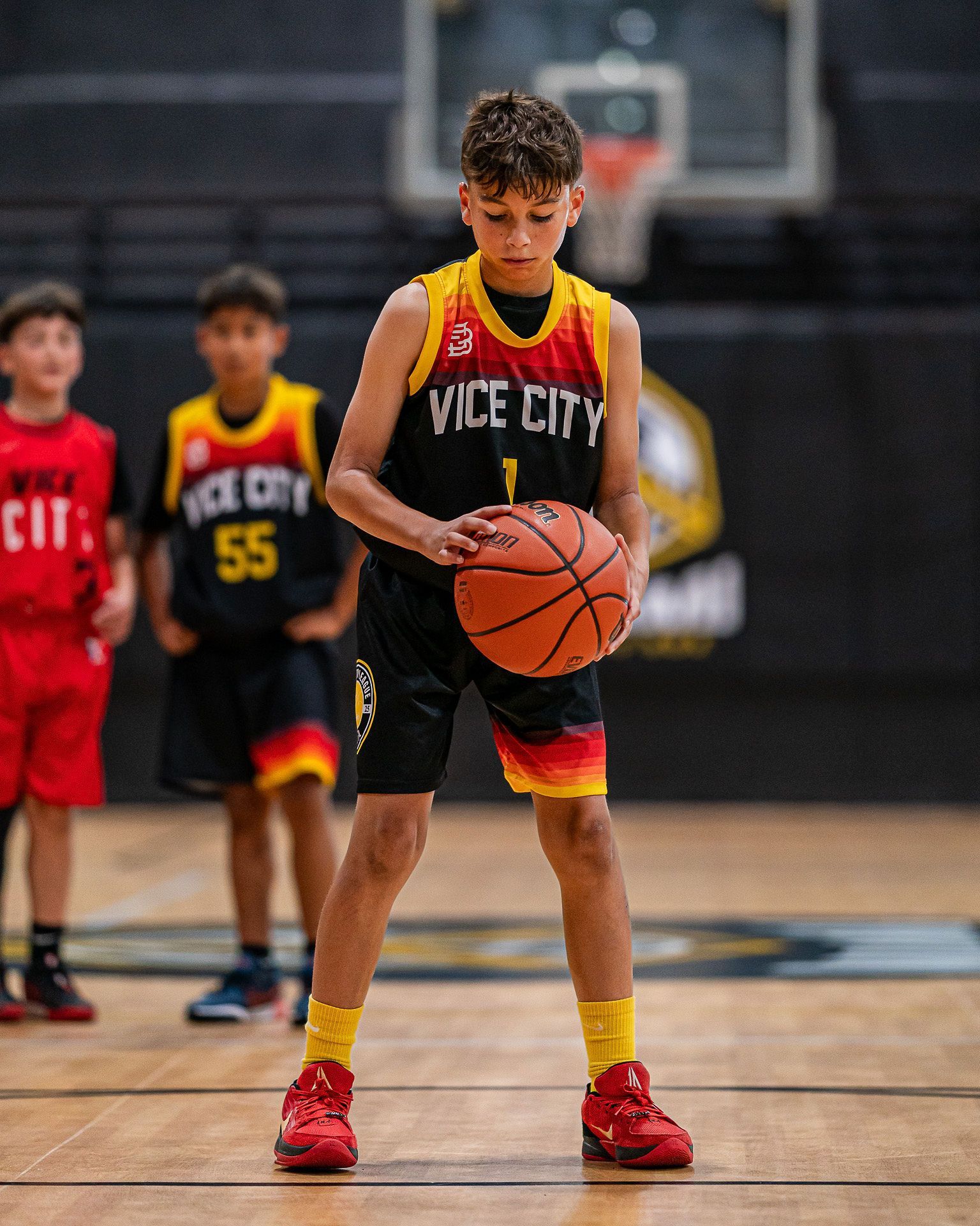 Youth basketball player shooting a free throw during a Vice City league game in Doral.