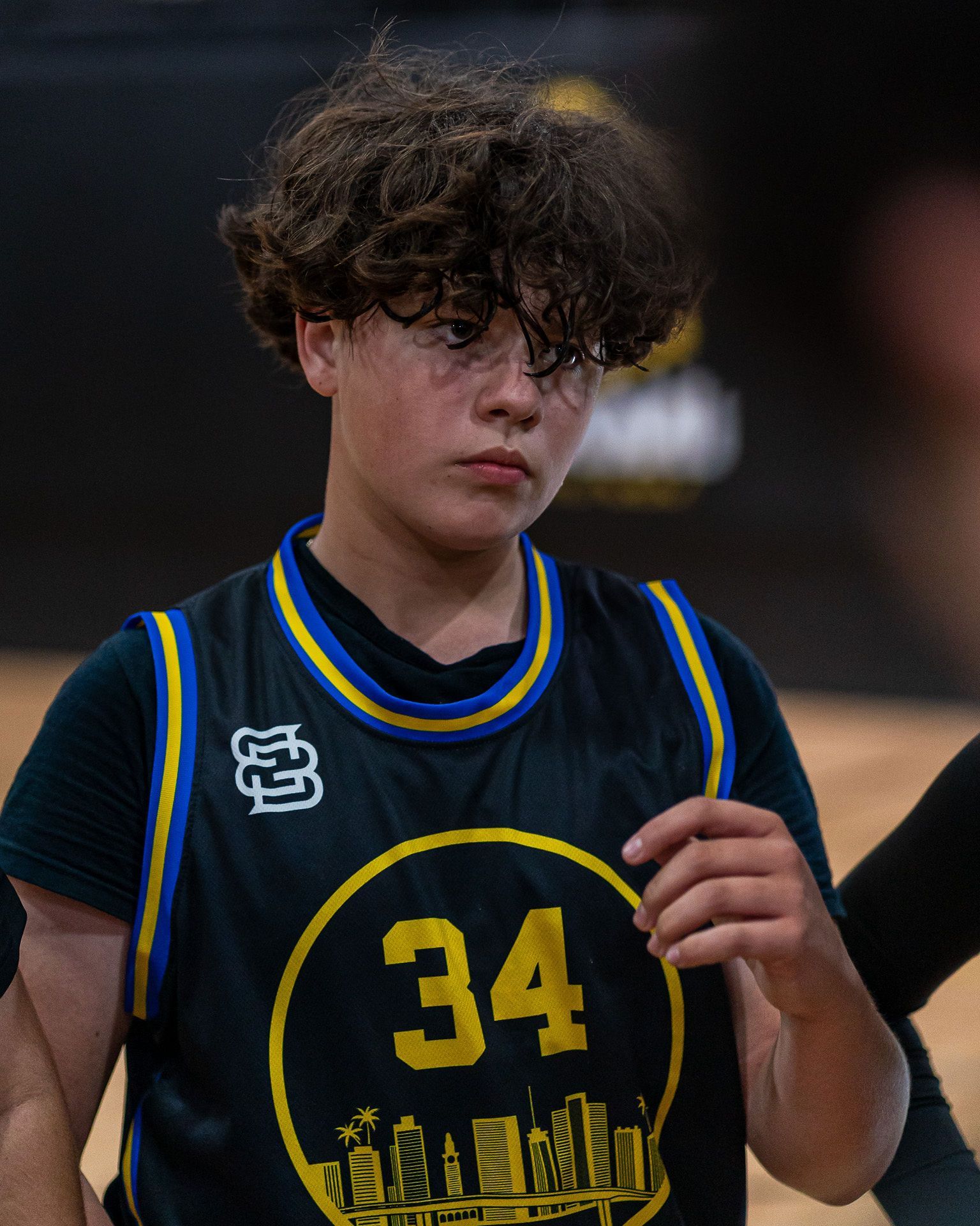 Youth basketball player training with elite coach at Vice City Basketball Academy in Miami.