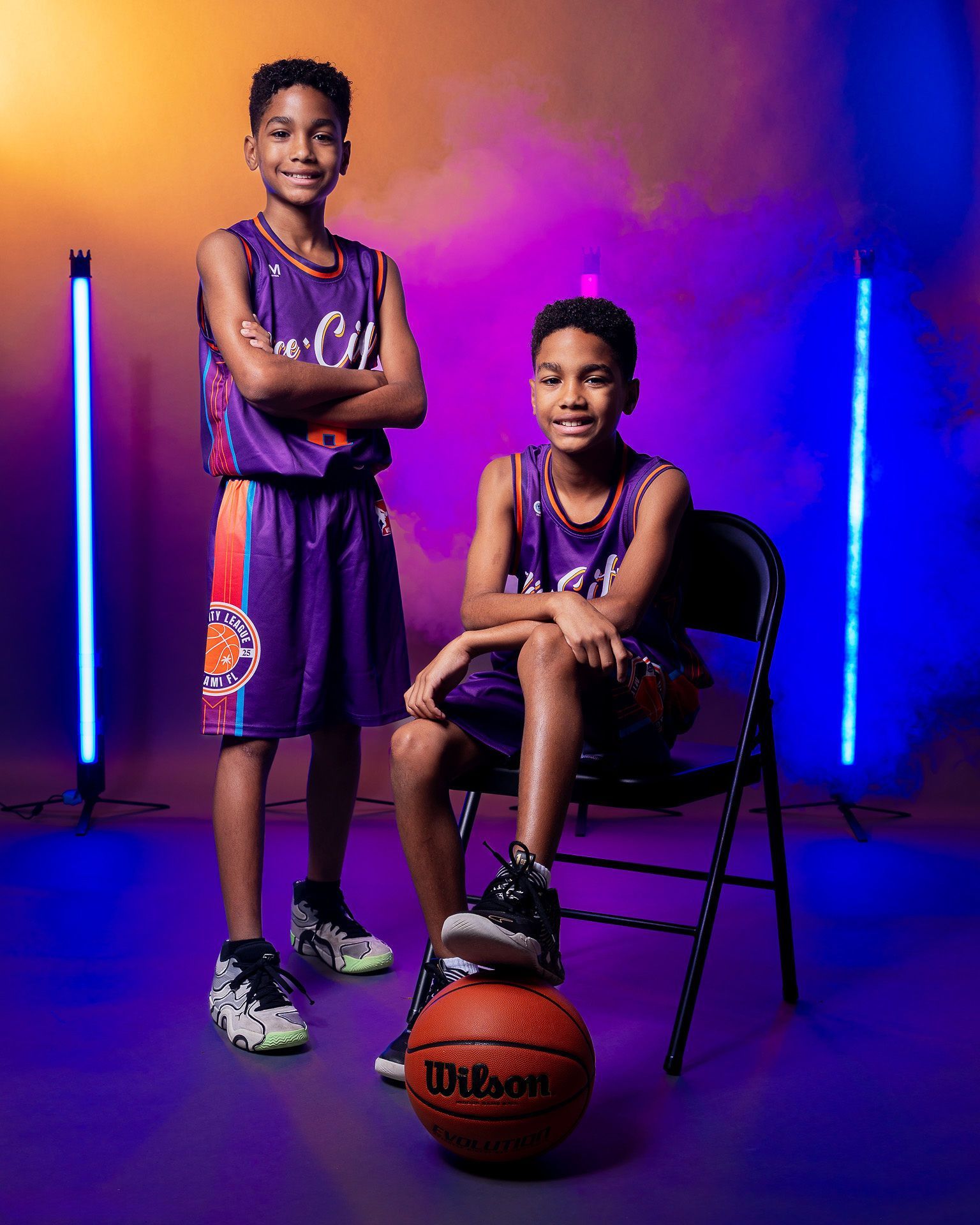 Youth basketball players posing during the season opener for their Media Day for Vice City League.
