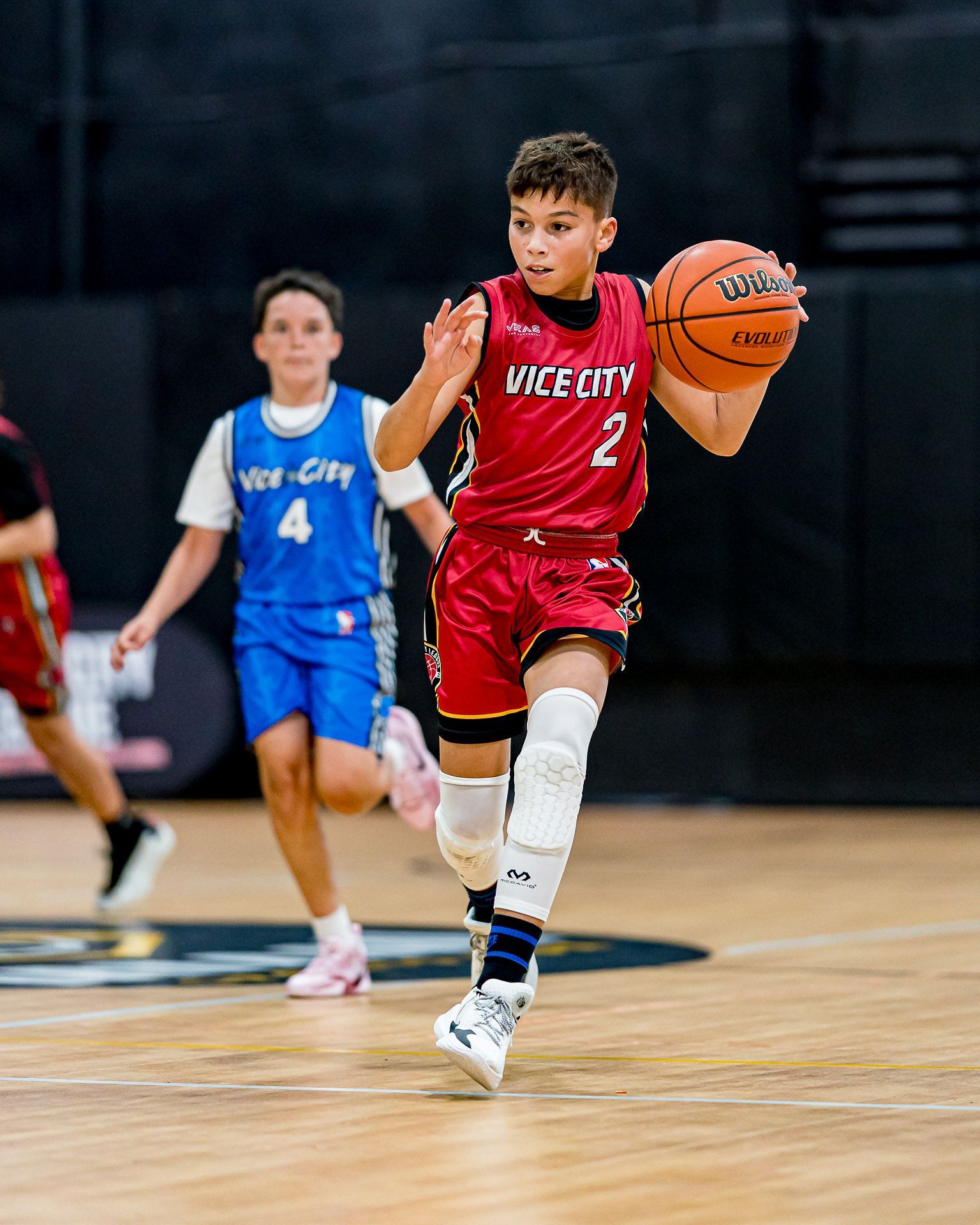 Vice City Basketball Academy player competing in our West Kendall youth basketball league, wearing our Miami Heat-inspired Vice City uniform.
