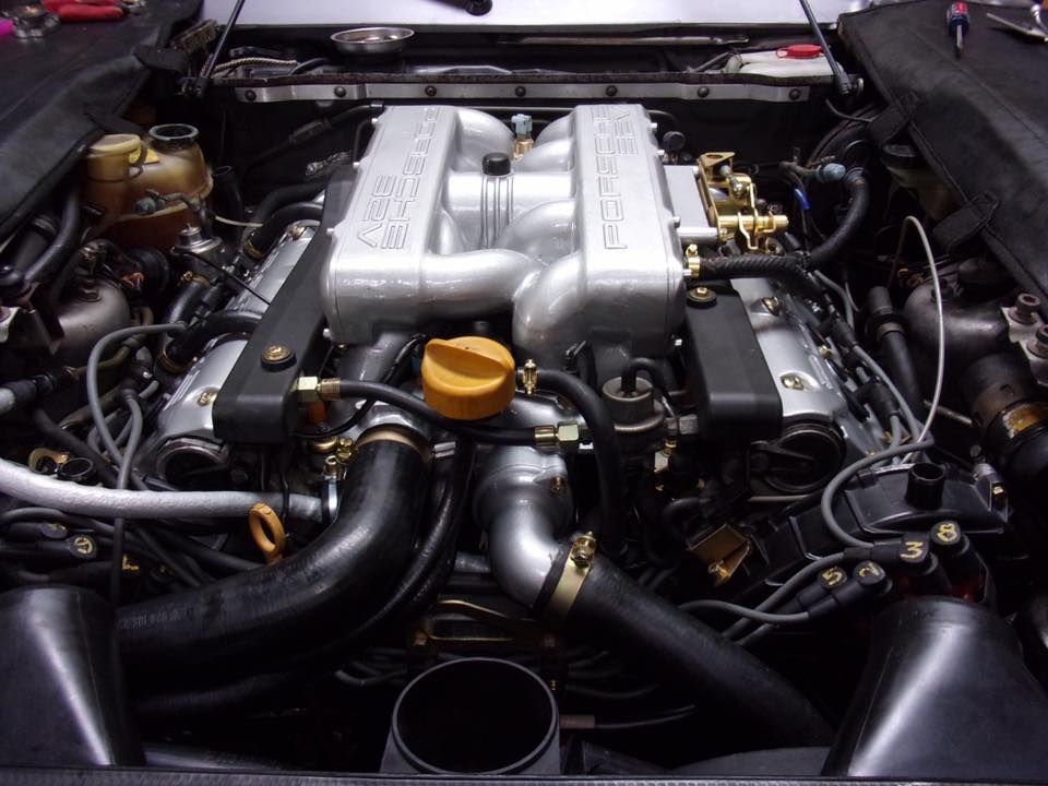 A car engine with the word porsche on it