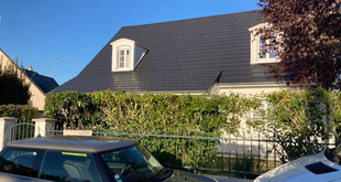 pose de couverture en ardoise sur une maison dans le cotentin