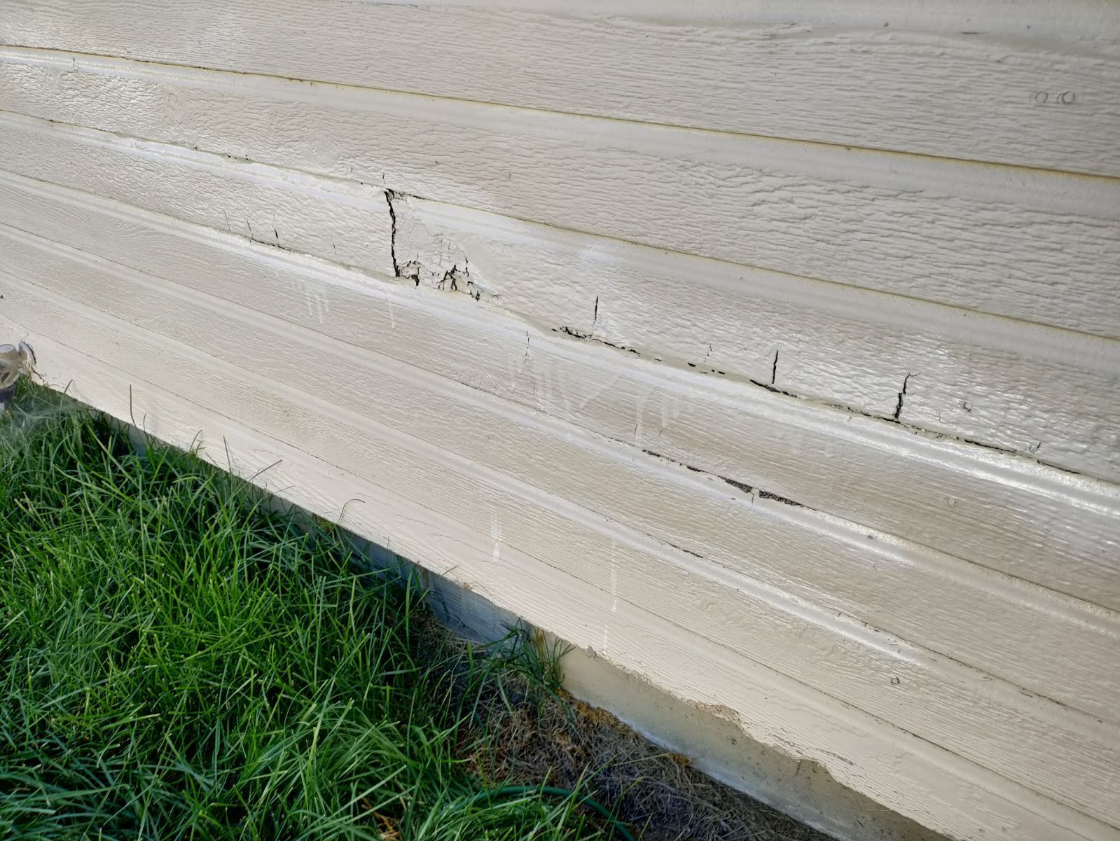 Bulging Cracked Siding Repair - Boise, ID - A1 Handyman